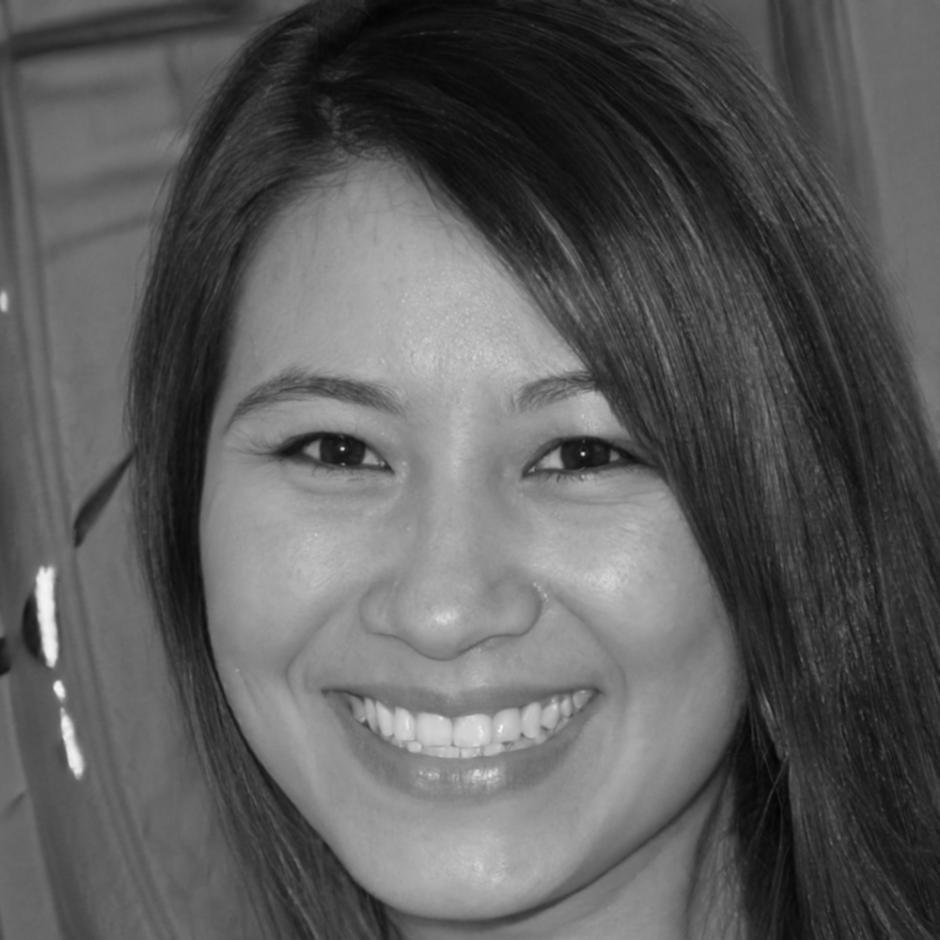 Finance professional reflecting on program impact